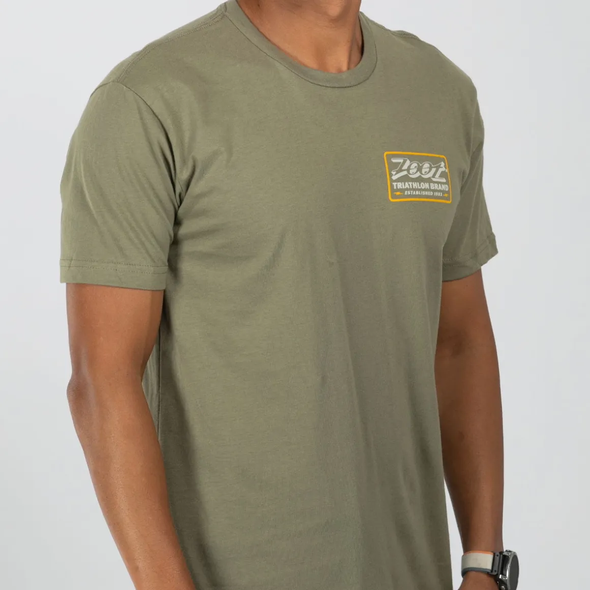 Unisex Shop Badge Tee - Light Olive